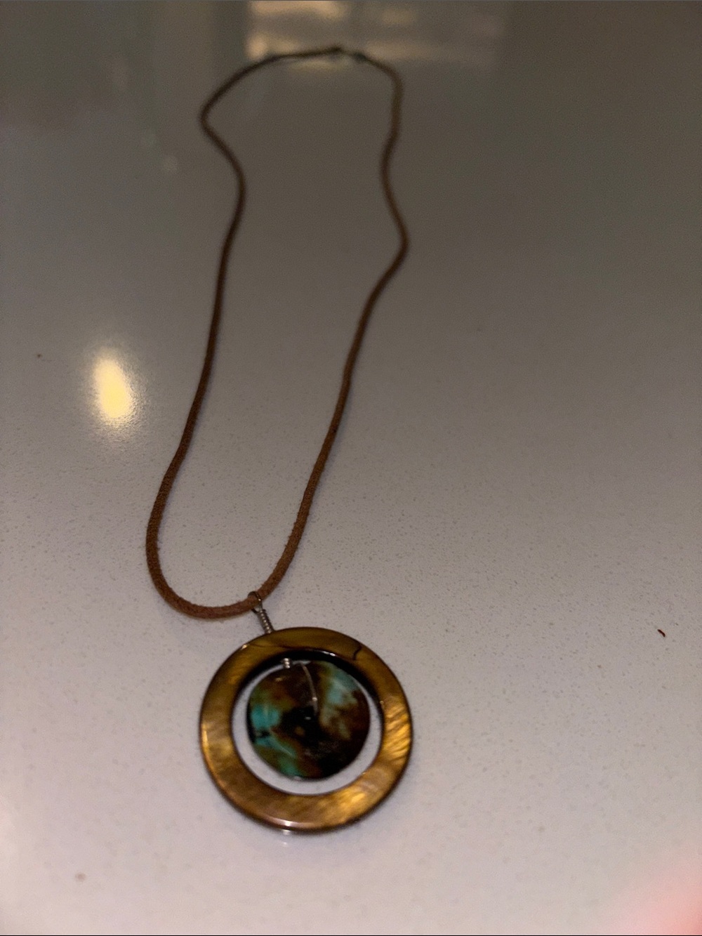 Brown leather cord Necklace with Gold-Tone Circular Pendant and Turquoise Accent